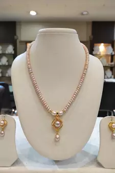 Pink pearl necklaces