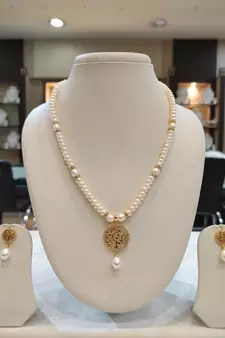 White pearl necklaces