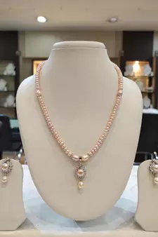 Pink pearl necklaces