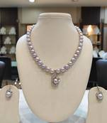 Grey pearl necklaces