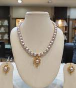 Grey pearl necklaces