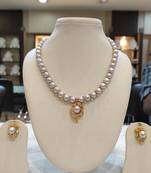 Grey pearl necklaces