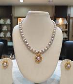 Grey pearl necklaces