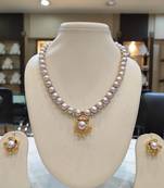 Grey pearl necklaces