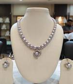 Grey pearl necklaces