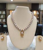 Grey pearl necklaces