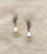 White pearl earrings