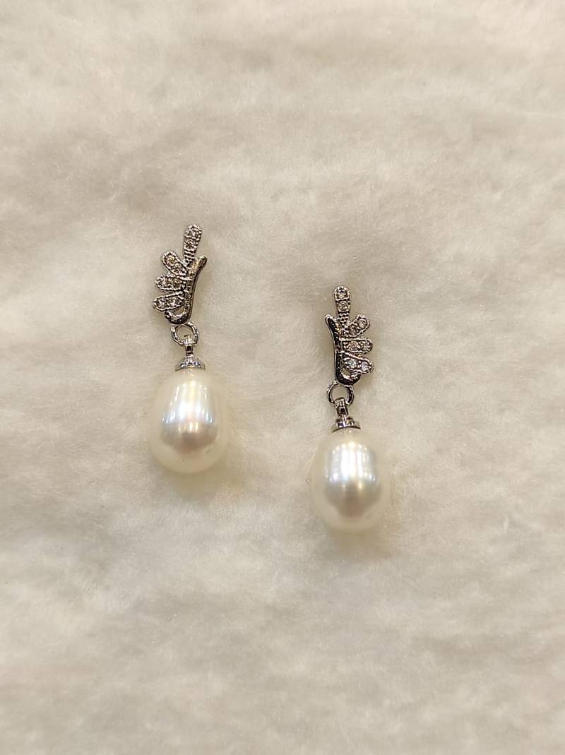 White pearl earrings