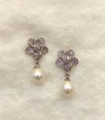White pearl earrings