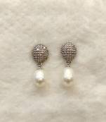White pearl earrings
