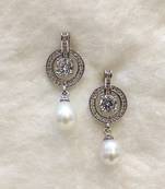 White pearl earrings