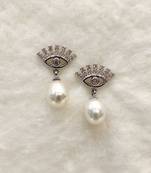 White pearl earrings