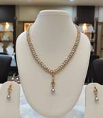 Grey pearl necklaces