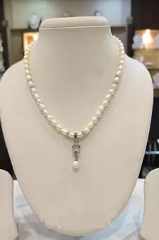 White pearl necklaces