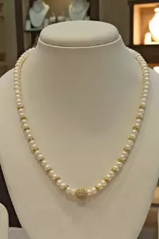 White pearl necklaces