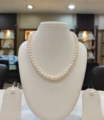 White pearl necklaces