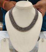 Grey pearl necklaces