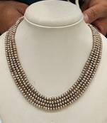 Grey pearl necklaces