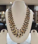 Grey pearl necklaces