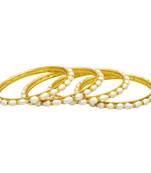 White pearl bangles-and-bracelets