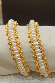 White pearl bangles-and-bracelets