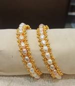 Pink pearl bangles-and-bracelets
