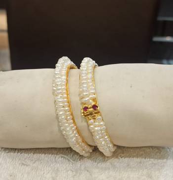 White pearl bangles-and-bracelets 1