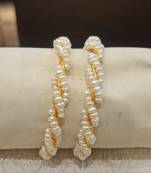 White pearl bangles-and-bracelets