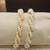 White pearl bangles-and-bracelets