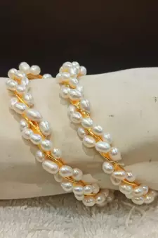 White pearl bangles-and-bracelets