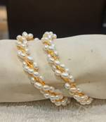 White pearl bangles-and-bracelets