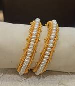 White pearl bangles-and-bracelets