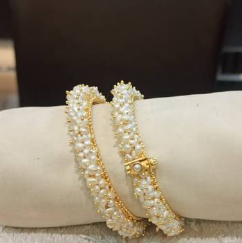 White pearl bangles-and-bracelets 1