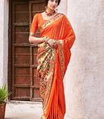 Orange woven banarasi silk saree with blouse