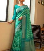 Green woven tussar silk saree with blouse