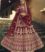 Maroon Hand work and Heavy Embroidered velvet Semi Stitched Bridal Lehenga