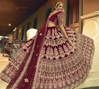 Maroon Hand work and Heavy Embroidered velvet Semi Stitched Bridal Lehenga 3