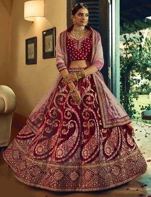 Maroon Hand work and Heavy Embroidered velvet Semi Stitched Bridal Lehenga 1