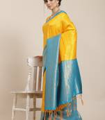 Yellow color Kanjivaram semi silk saree with unstitched blouse