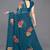 Turquoise printed georgette saree with blouse