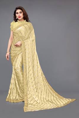 Beige embroidered lycra saree with blouse 1