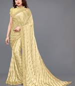 Beige embroidered lycra saree with blouse