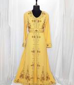 Yellow luxurious Moroccan Kaftan	With Sun-proof hijab.