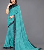 Turquoise embroidered lycra saree with blouse
