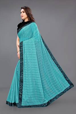 Turquoise embroidered lycra saree with blouse 4