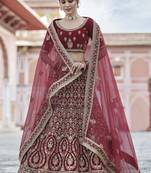 Auspicious Maroon hand work and heavy embroidered velvet semi stitched Bridal lehenga