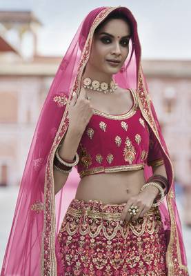 Convivial Pink hand work and heavy embroidered velvet Semi Stitched wedding Lehenga 2