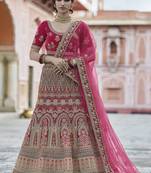 Propitious Pink hand work and heavy embroidered velvet Semi Stitched wedding Lehenga