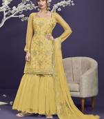 Yellow embroidered net salwar