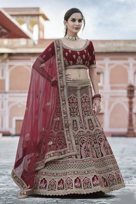 Benign Maroon hand work and heavy embroidered velvet Semi Stitched Bridal Lehenga 1